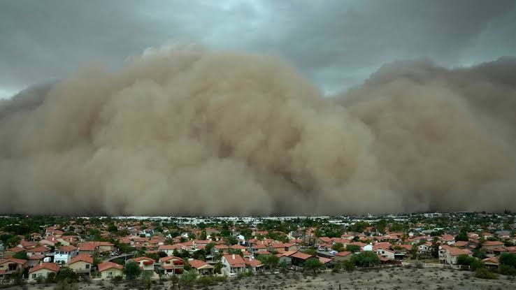 Haboob dust storm wall approaching homes near Queen Creek, AZ